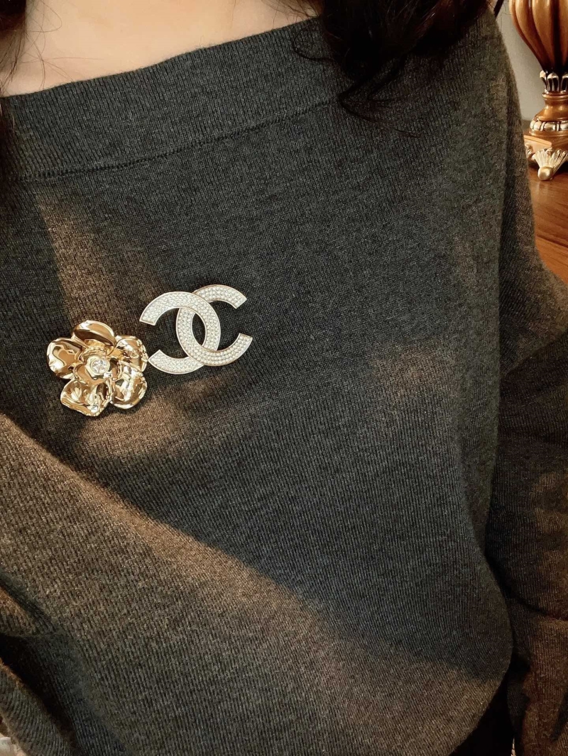 Ch**el brooches